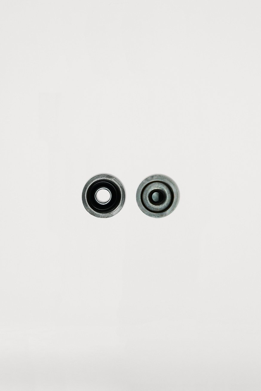 Black male snap button (old) - KOKADI